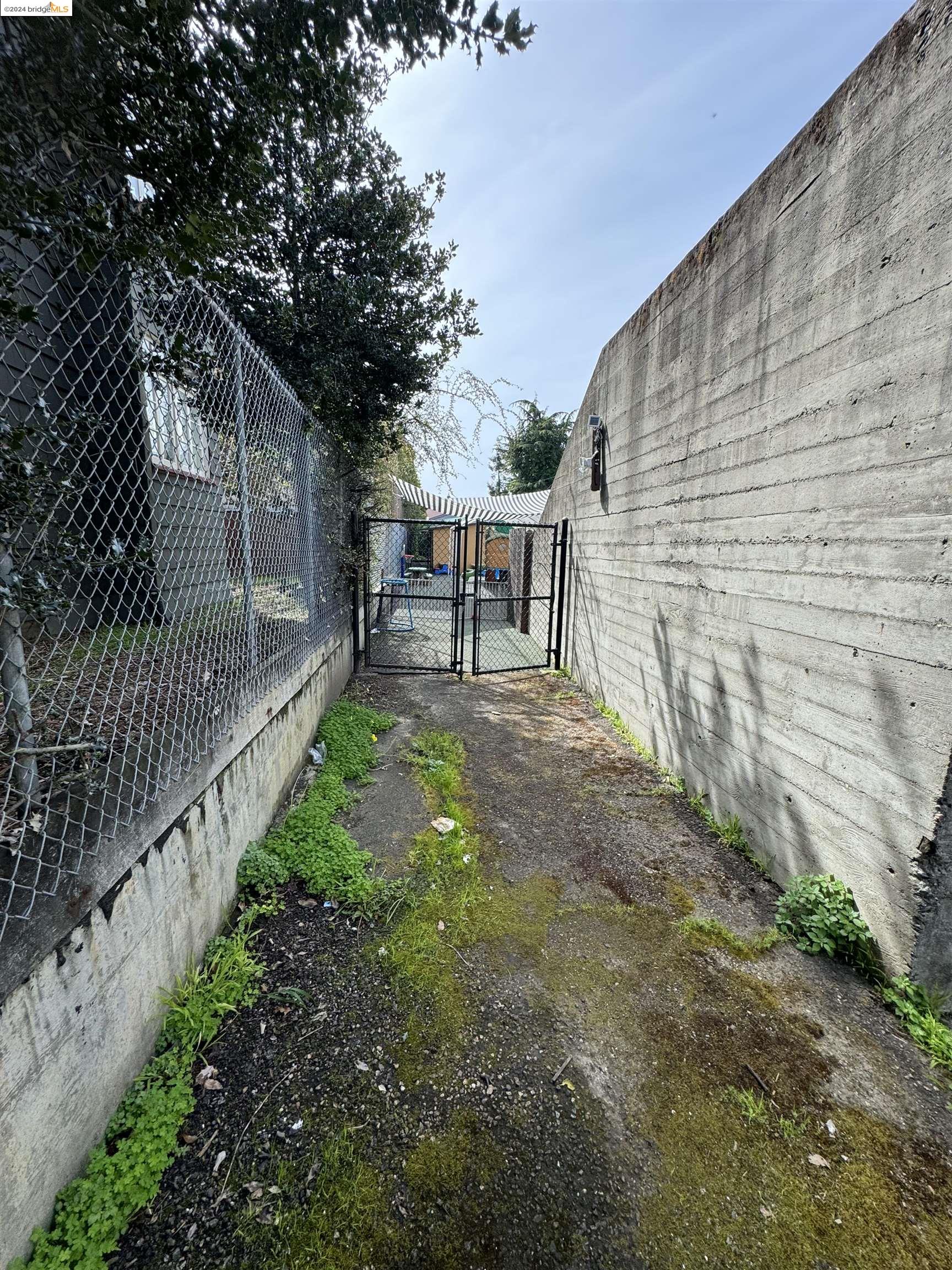2330 Prince Street Berkeley, CA 94705 - Photo 27 of 55 a view of an outdoor space with wooden fence