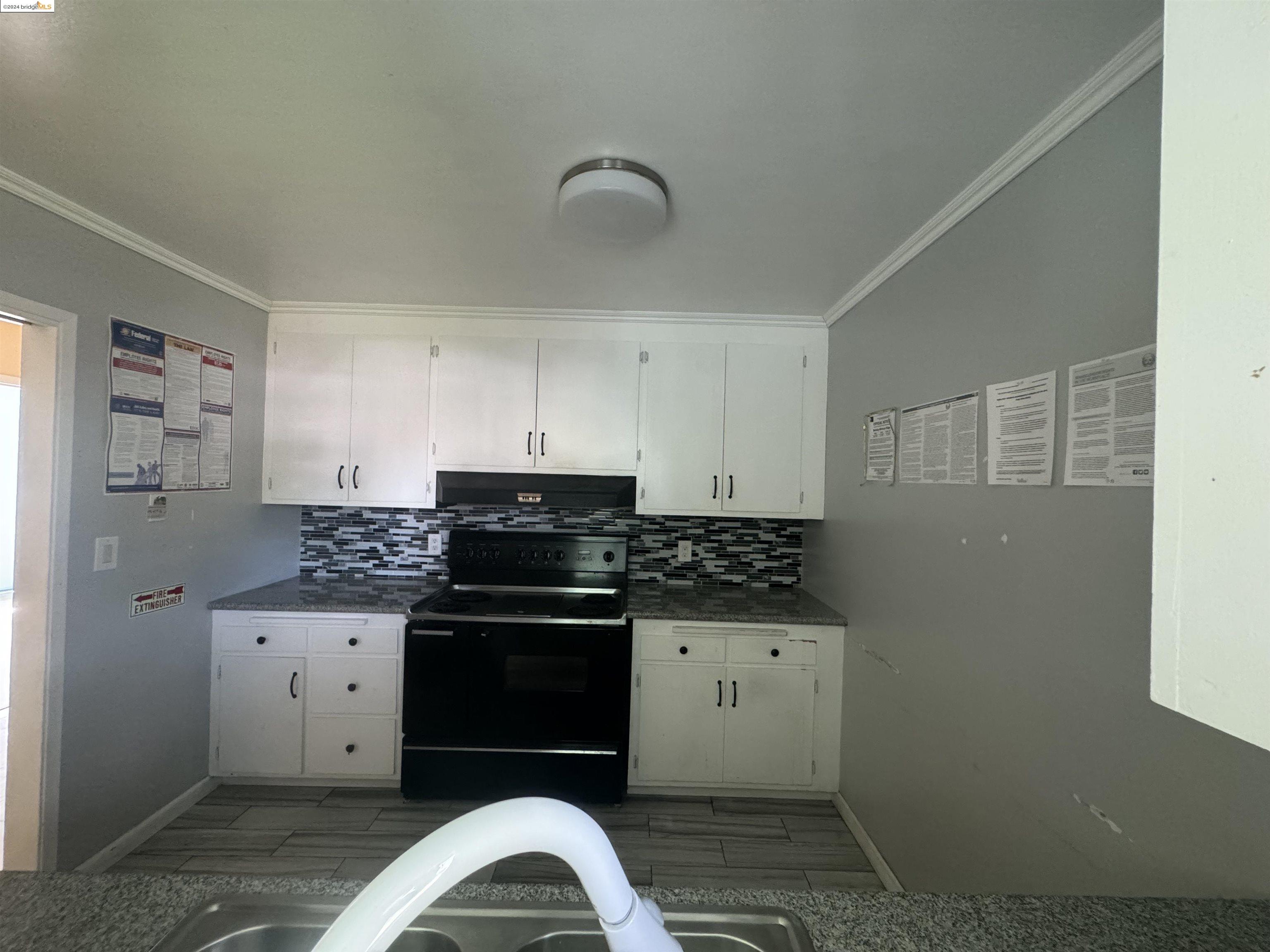 2330 Prince Street Berkeley, CA 94705 - Photo 49 of 55 a kitchen with a stove and a refrigerator