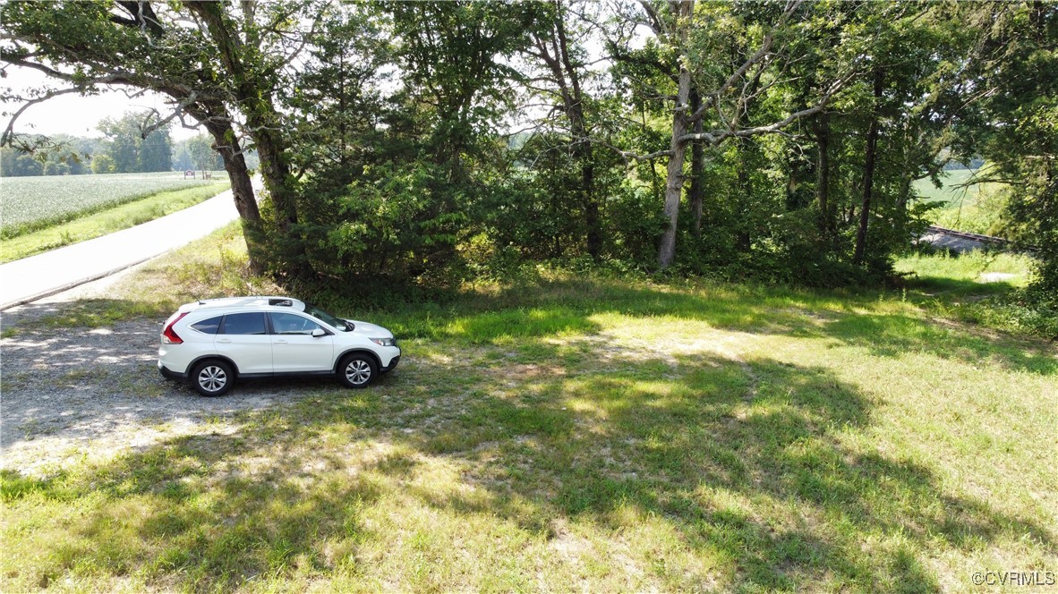 Tbd Hartley Road Beaverdam, VA 23015 - Photo 17 of 28 a view of backyard with a car parked