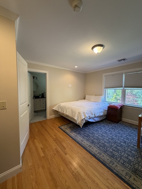 65 Denton Road Wellesley, MA 02482 - Photo 9 of 16 a bedroom with double bed and a large window