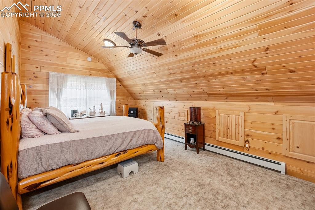 13016 Cielo Grande Road Weston, CO 81091 - Photo 20 of 49 a bedroom with a bed and wooden floor