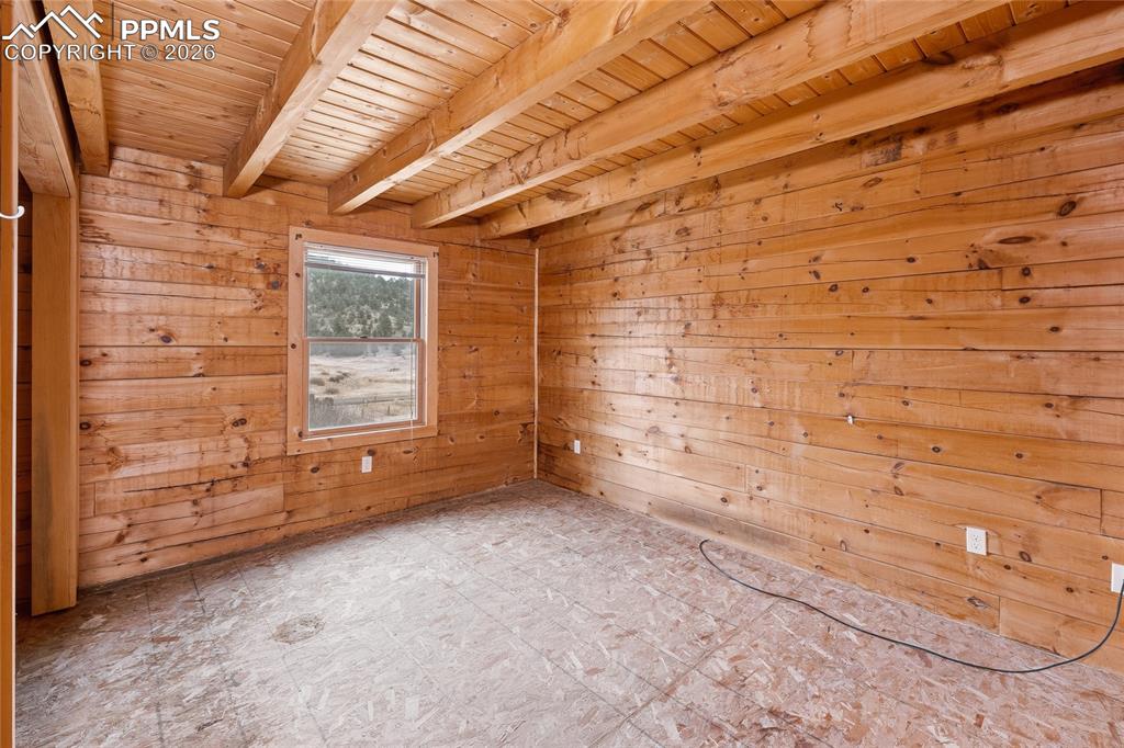 13016 Cielo Grande Road Weston, CO 81091 - Photo 30 of 49 a view of an empty room with brick walls