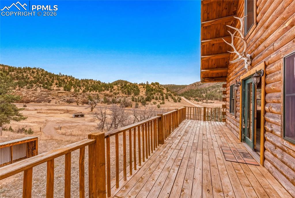 13016 Cielo Grande Road Weston, CO 81091 - Photo 35 of 49 a view of balcony with wooden floor and city view