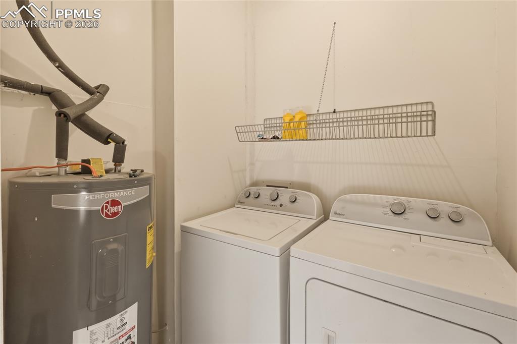 13016 Cielo Grande Road Weston, CO 81091 - Photo 40 of 49 a utility room with dryer and washer