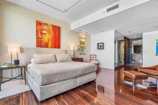 a bathroom with a toilet a sink and a shower