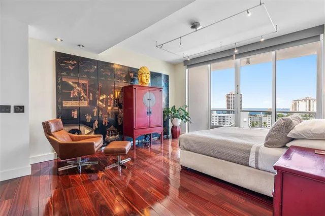 a view of walk in closet and kitchen