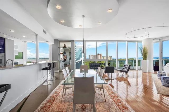 a bedroom with a bed and a lamp