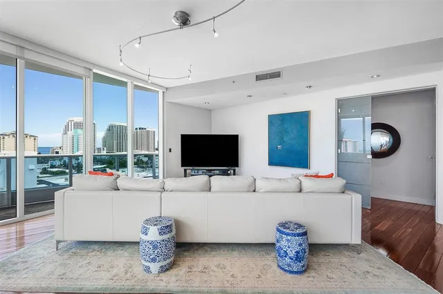 a view of a balcony with a table and chairs