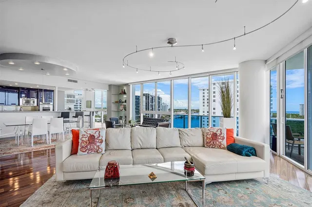 a view of a lake with tall buildings