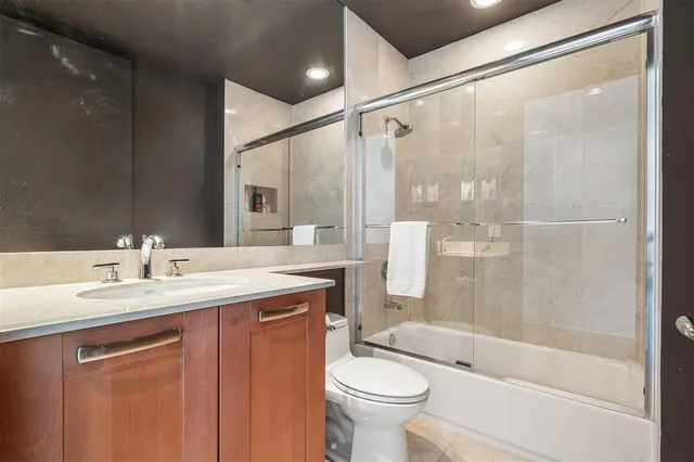 an aerial view of a house with a lake view