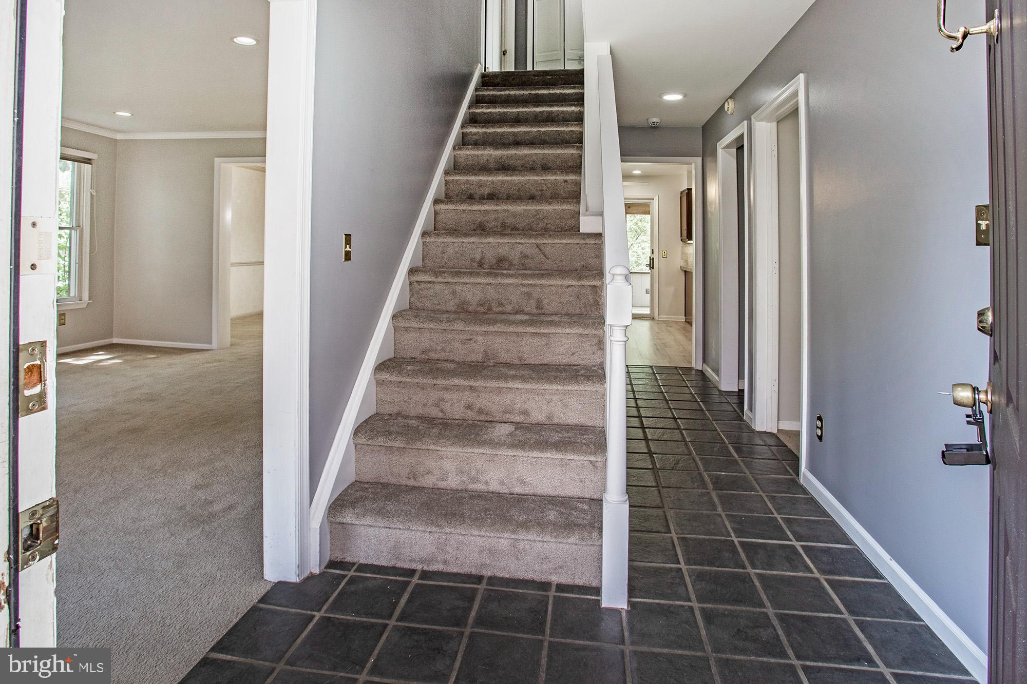1139 Webster Drive Wilmington, DE 19803 - Photo 16 of 37 a view of an entryway with wooden floor