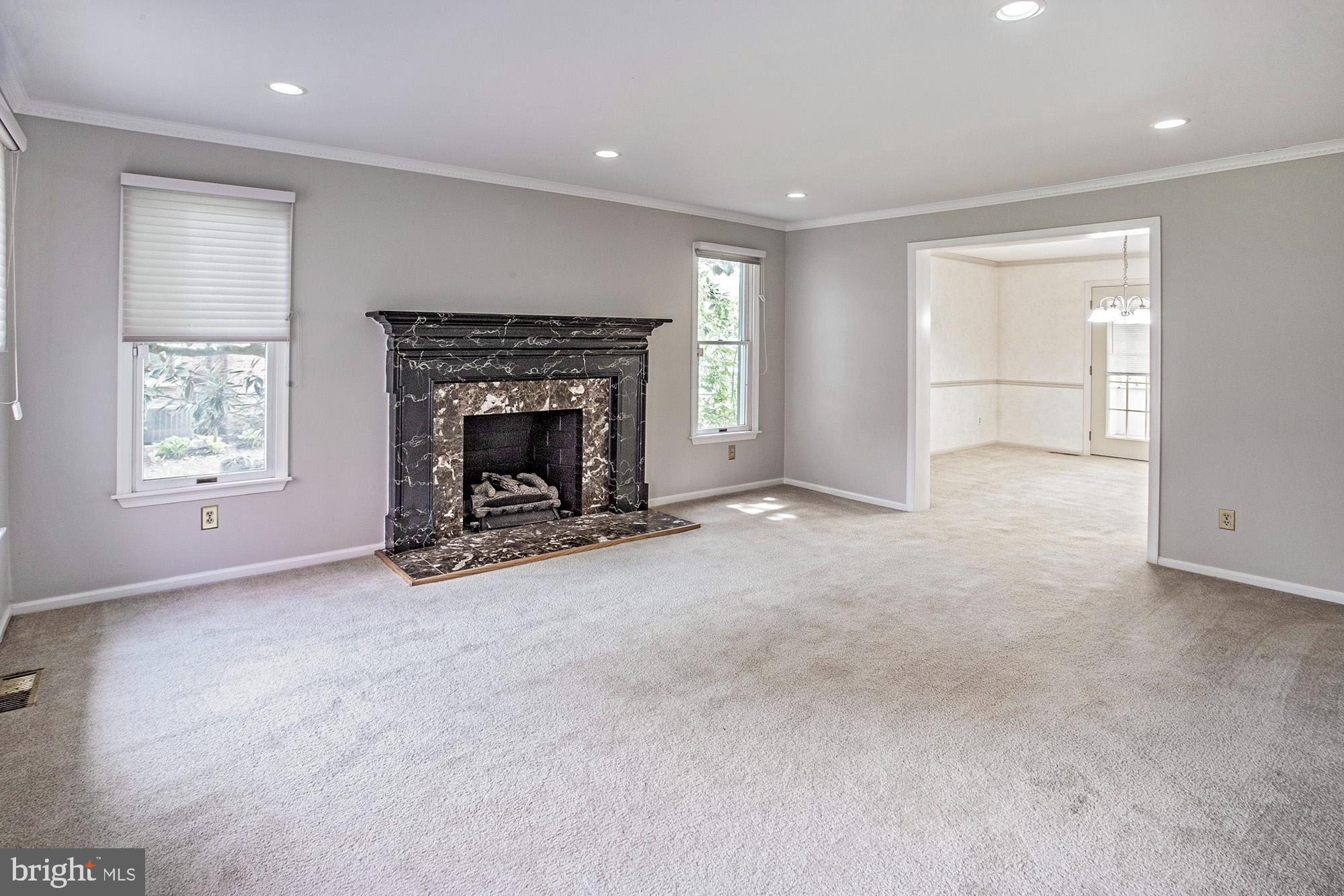 1139 Webster Drive Wilmington, DE 19803 - Photo 20 of 37 an empty room with furniture and a fireplace