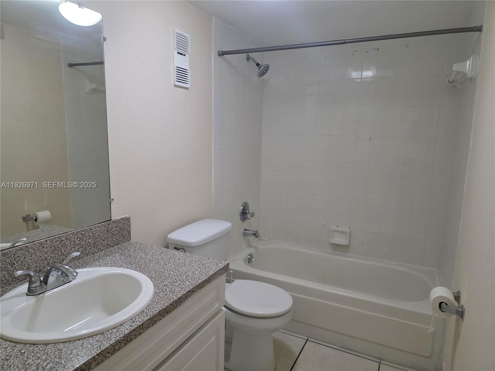 4400 West 16th Avenue, Unit 630 Hialeah, FL 33012 - Photo 13 of 34 a bathroom with a sink toilet and a bathtub
