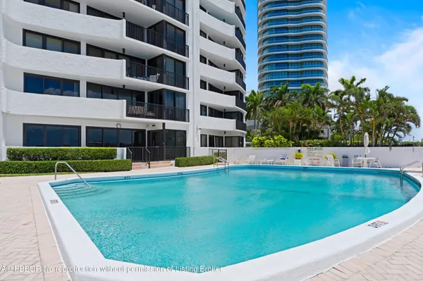 a view of swimming pool with a garden