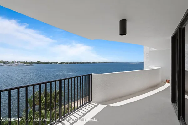 a balcony with view of city
