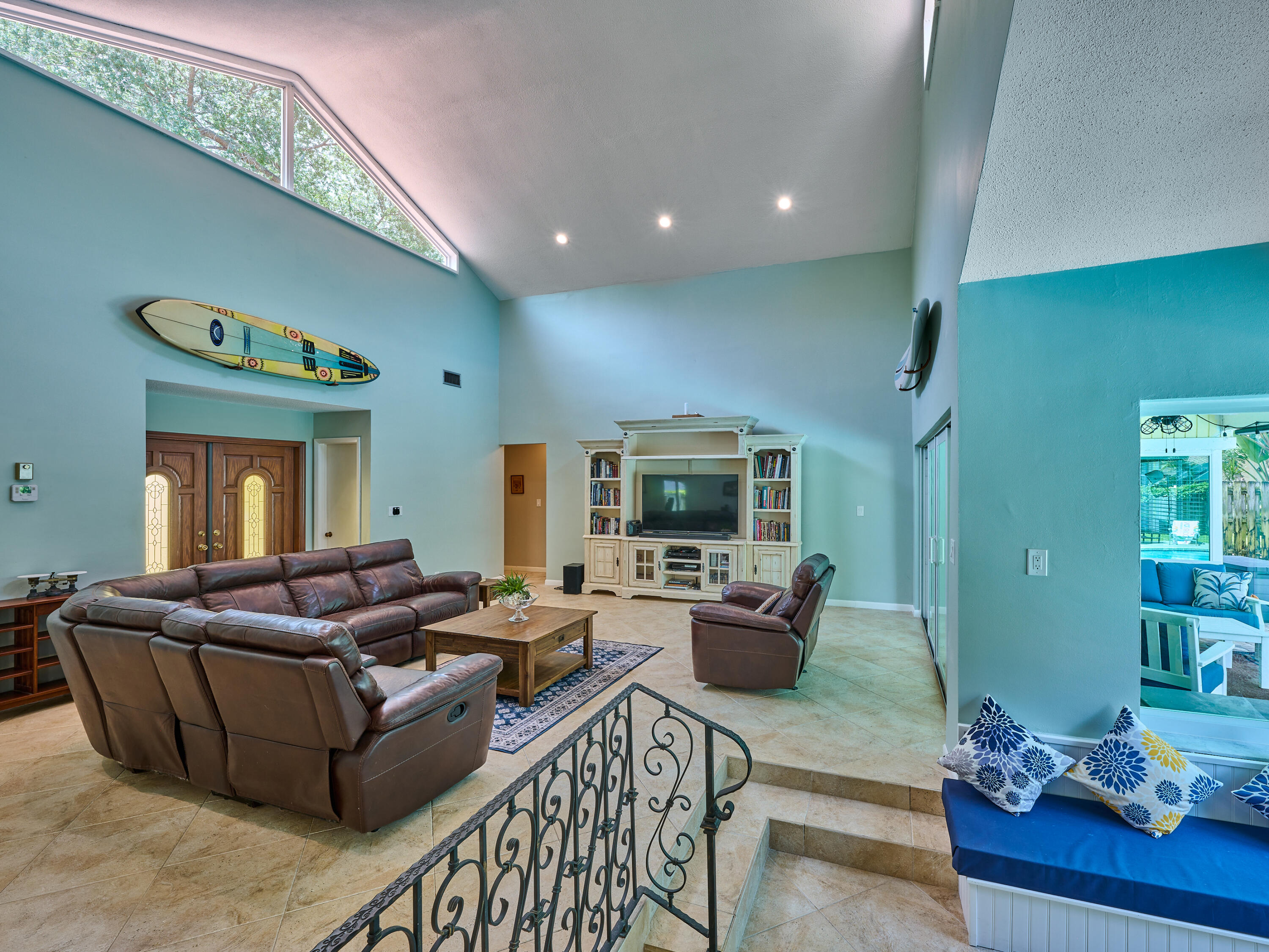 4155 Northwest 25th Way Boca Raton, FL 33434 - Photo 35 of 66 a living room with furniture and a flat screen tv
