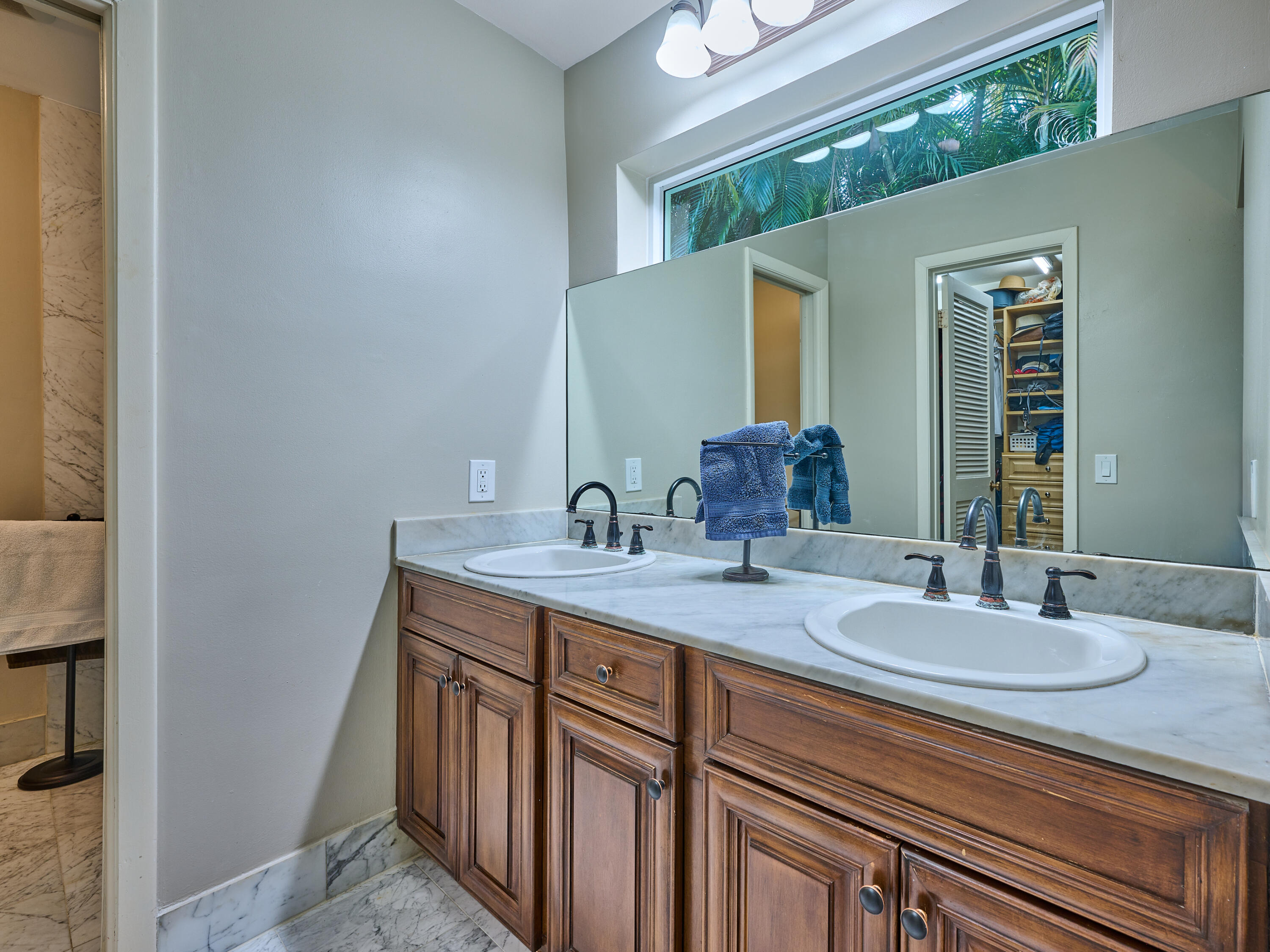 4155 Northwest 25th Way Boca Raton, FL 33434 - Photo 54 of 66 a bathroom with a sink double vanity and a mirror