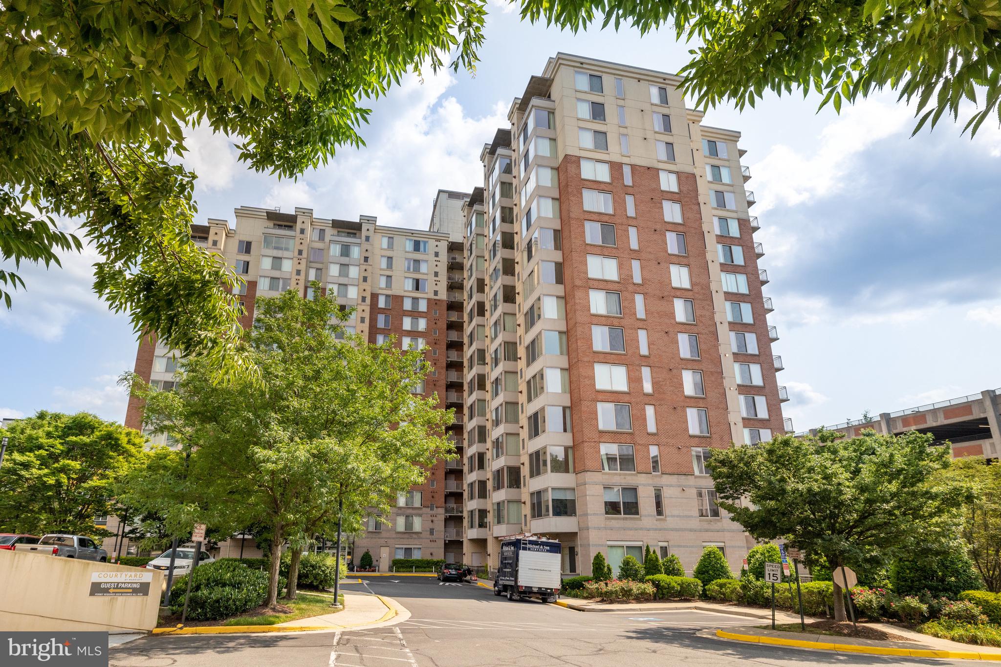 2726 Gallows Road, Unit 712 Vienna, VA 22180 - Photo 1 of 55 a view of a tall building next to a road