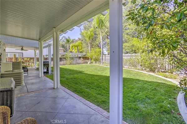a view of a porch with a backyard