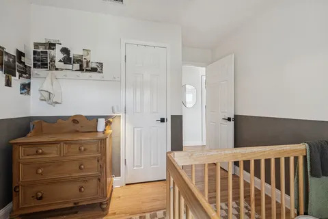 a view of hallway with cabinet