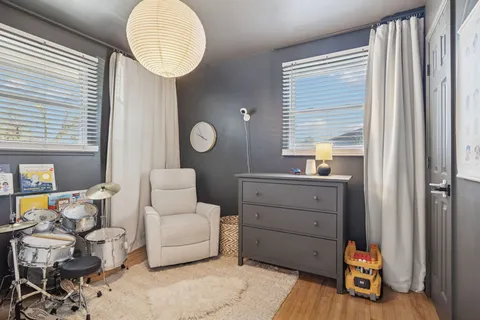 a room with furniture and a window