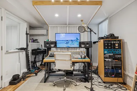 a view of a room with gym equipment