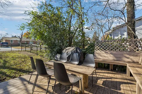 a view of a chairs and table in the patio