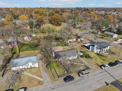 an aerial view of residential house with outdoor space