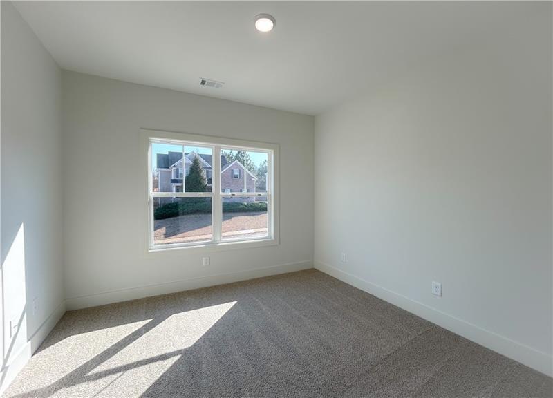 27 Bridgestone Way Cartersville, GA 30120 - Photo 22 of 31 an empty room with a window