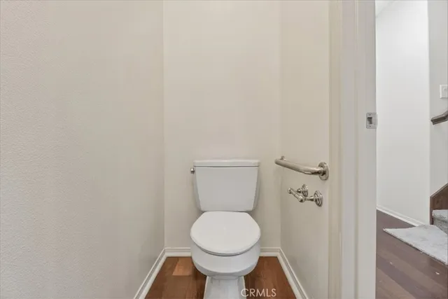 a bathroom with a toilet and a sink