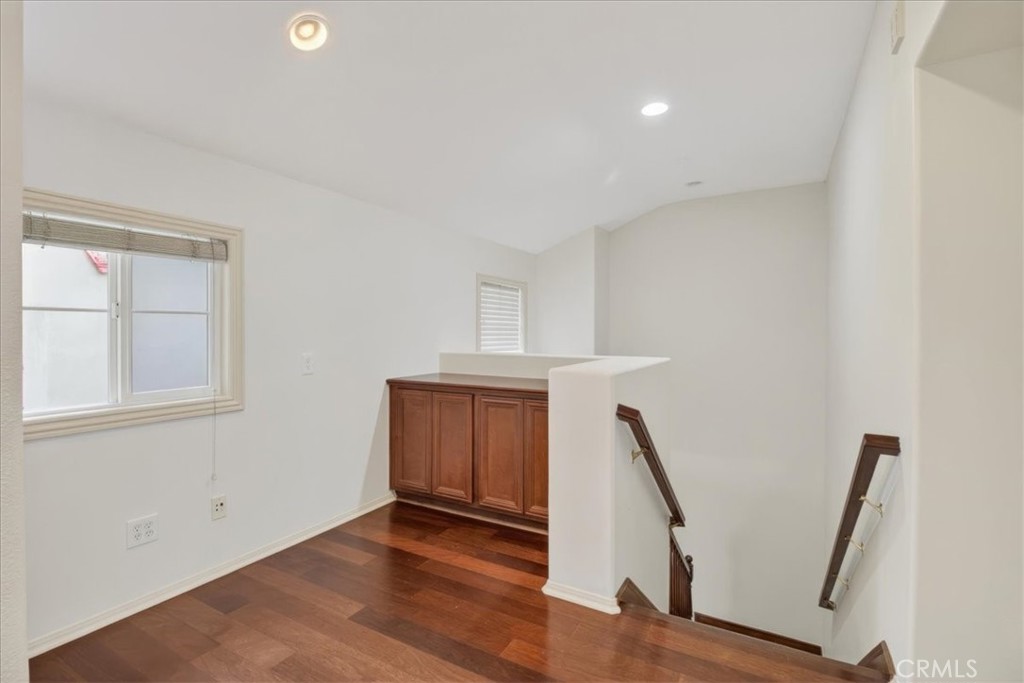 19266 Scripts Court Huntington Beach, CA 92648 - Photo 18 of 47 a view of an entryway with wooden floor