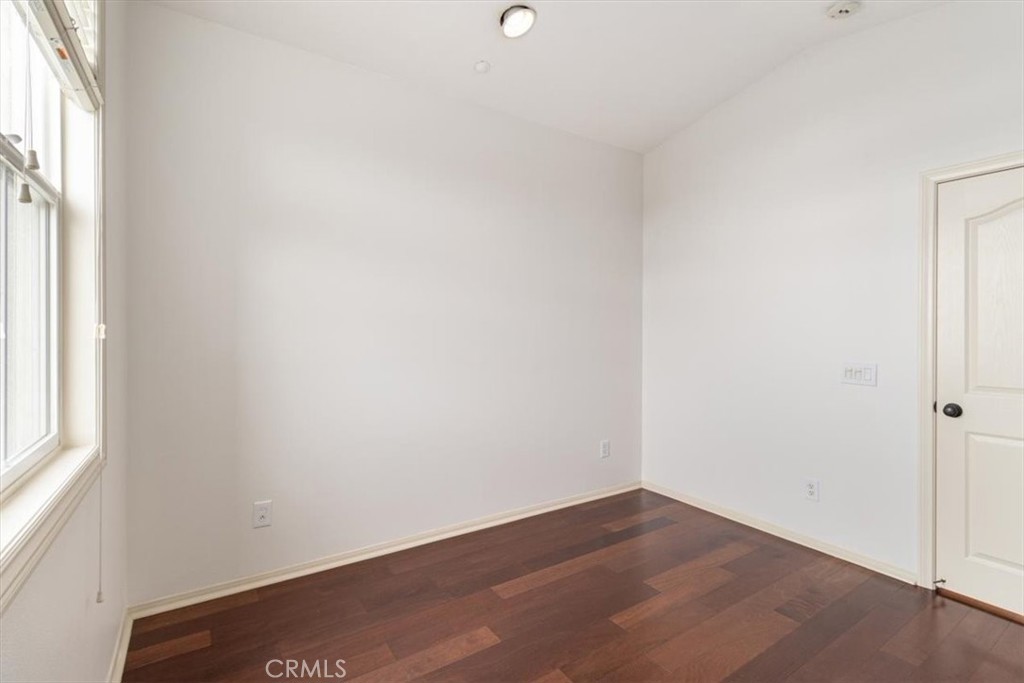 19266 Scripts Court Huntington Beach, CA 92648 - Photo 20 of 47 a view of an empty room with a window