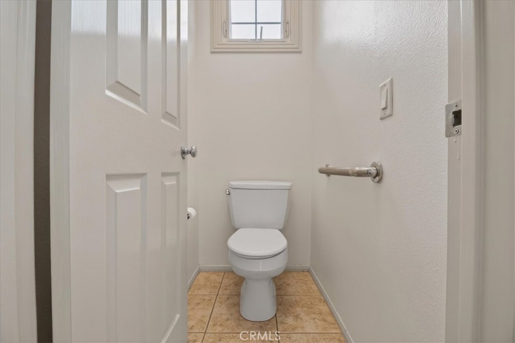 19266 Scripts Court Huntington Beach, CA 92648 - Photo 31 of 47 a bathroom with a toilet