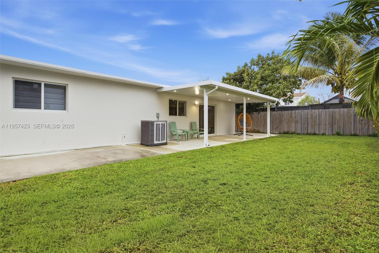 941 East 16th Place Hialeah, FL 33010 - Photo 27 of 32 a front view of house with yard and green space