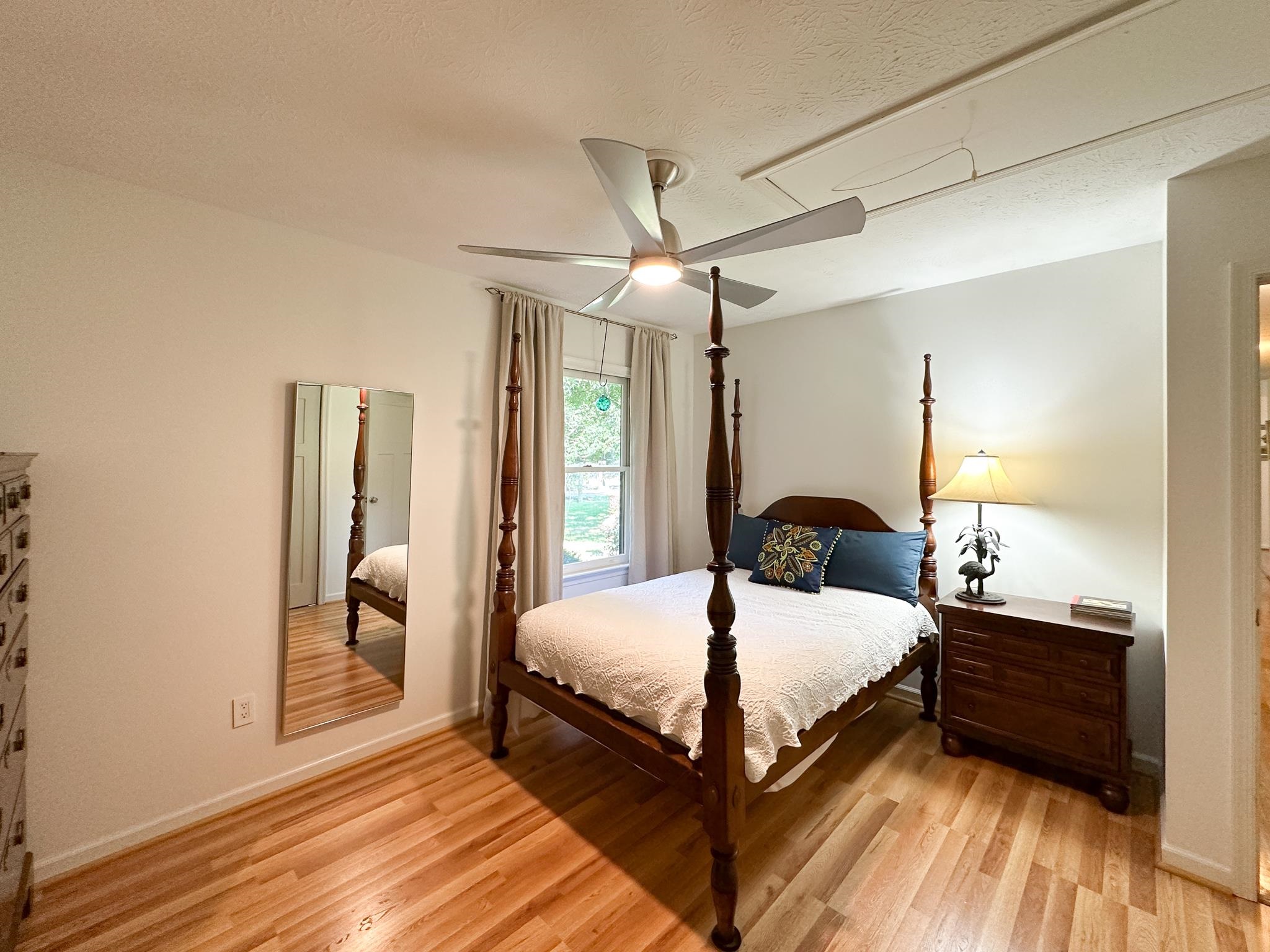564 Union Church Road Churchville, VA 24421 - Photo 26 of 35 a bedroom with a bed and a mirror