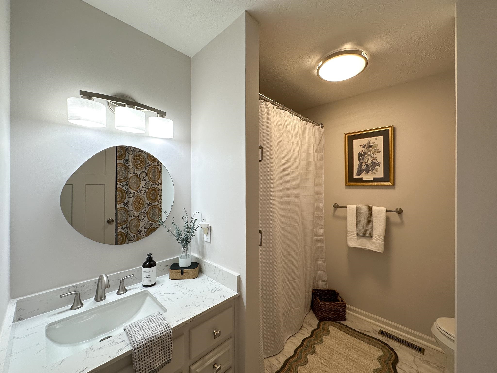564 Union Church Road Churchville, VA 24421 - Photo 27 of 35 a bathroom with a sink and a mirror