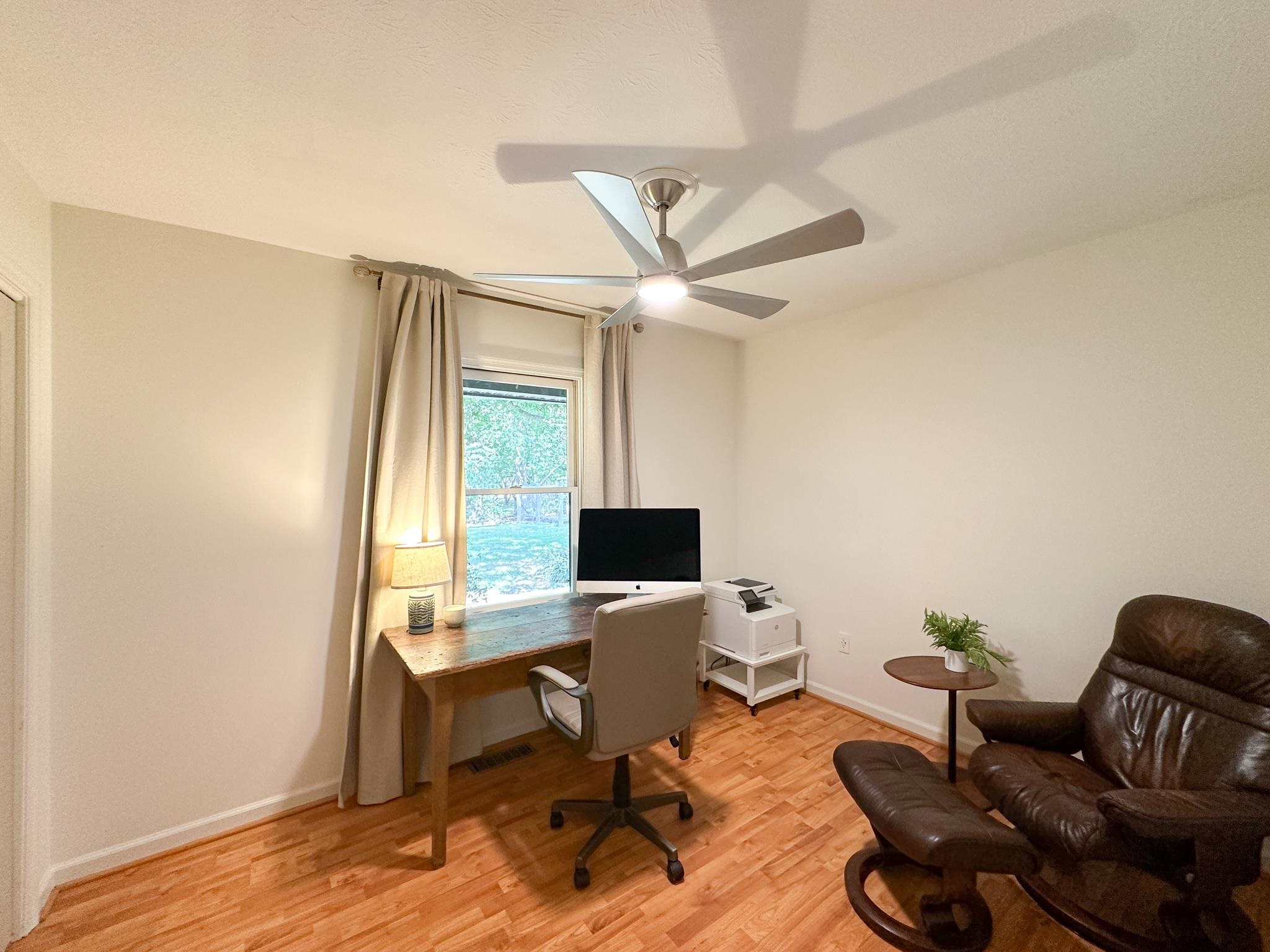 564 Union Church Road Churchville, VA 24421 - Photo 29 of 35 a view of a workspace with furniture and a window