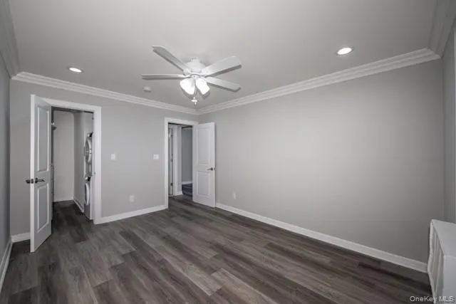 a view of an empty room and wooden floor