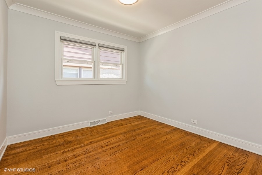 4150 Main Street Skokie, IL 60076 - Photo 13 of 28 an empty room with a window