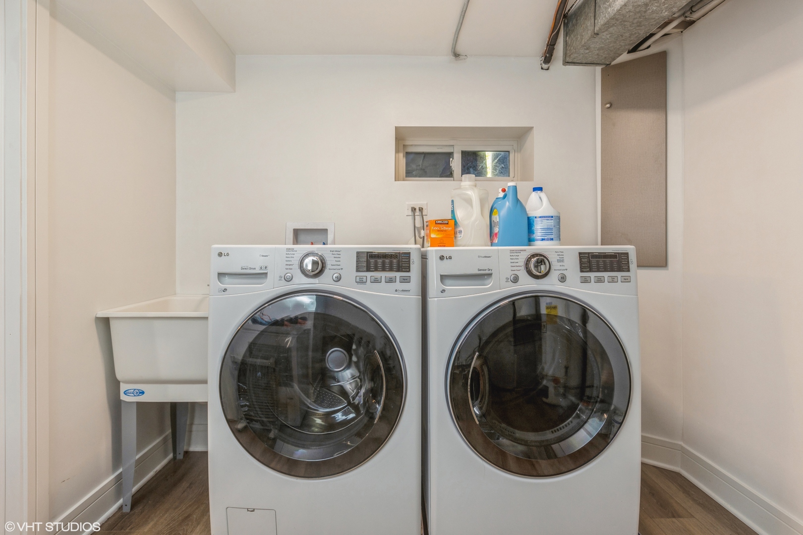4150 Main Street Skokie, IL 60076 - Photo 22 of 28 a utility room with dryer and washer