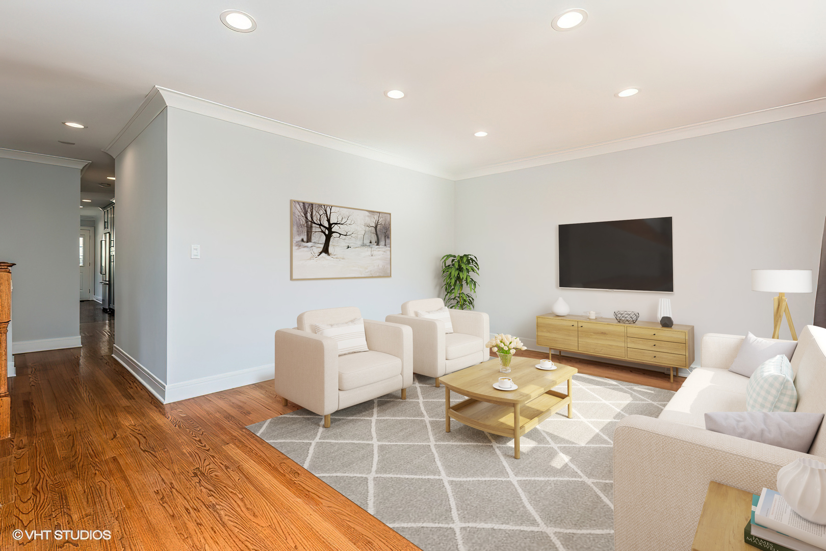 4150 Main Street Skokie, IL 60076 - Photo 5 of 28 a living room with furniture and a flat screen tv