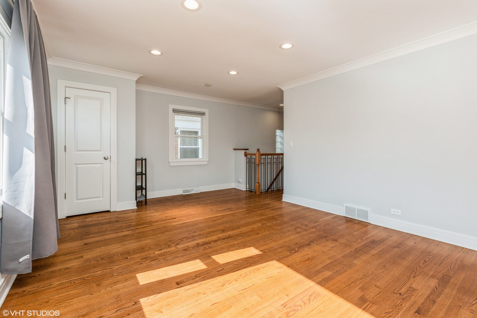 4150 Main Street Skokie, IL 60076 - Photo 7 of 28 a view of empty room with wooden floor and fan
