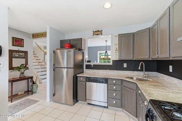 an aerial view of residential houses with swimming pool