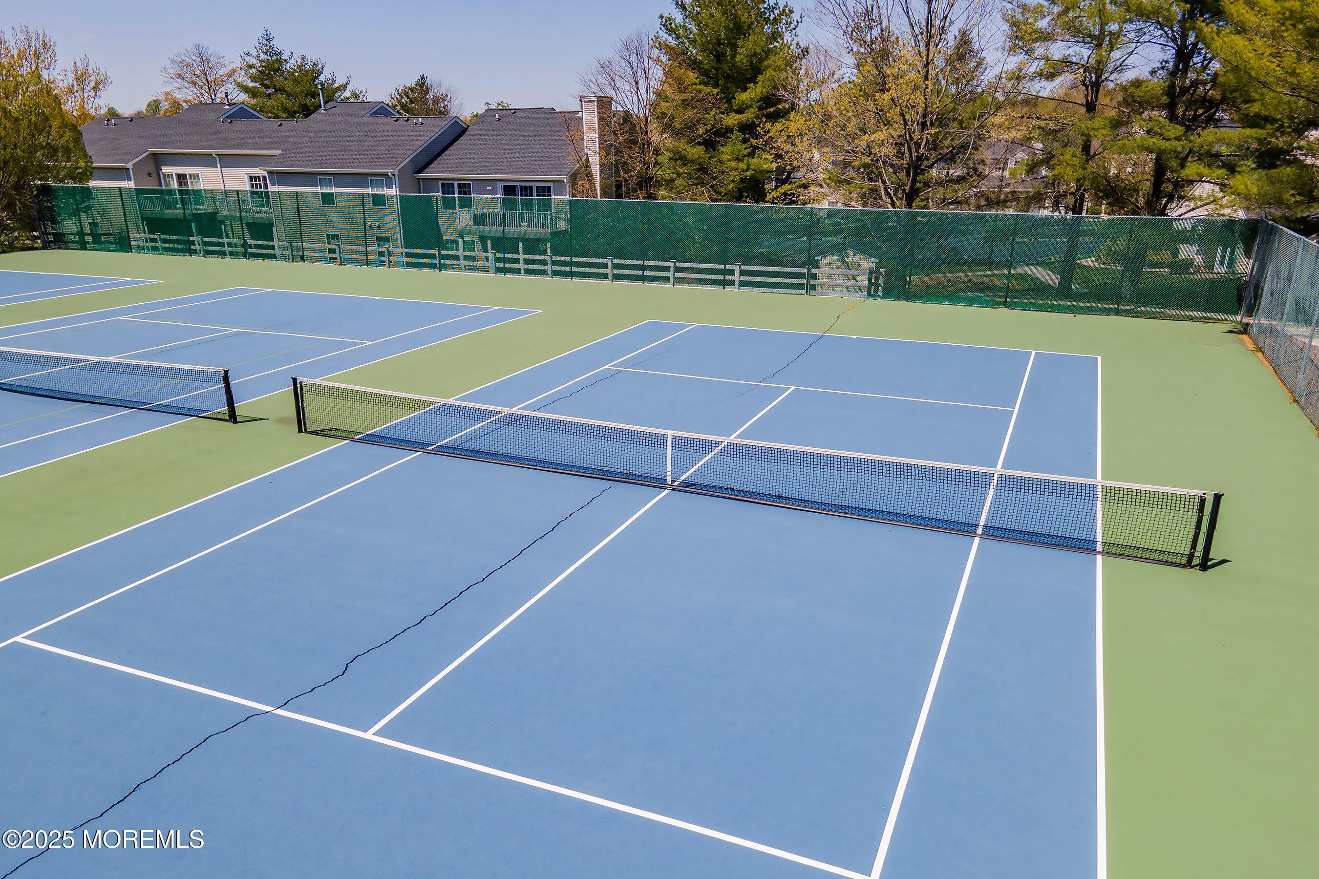 59 Perri Road Freehold, NJ 07728 - Photo 36 of 36 a view of an outdoor space and tennis court