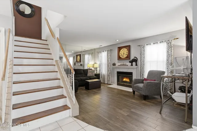 a kitchen with a stove a sink and a microwave