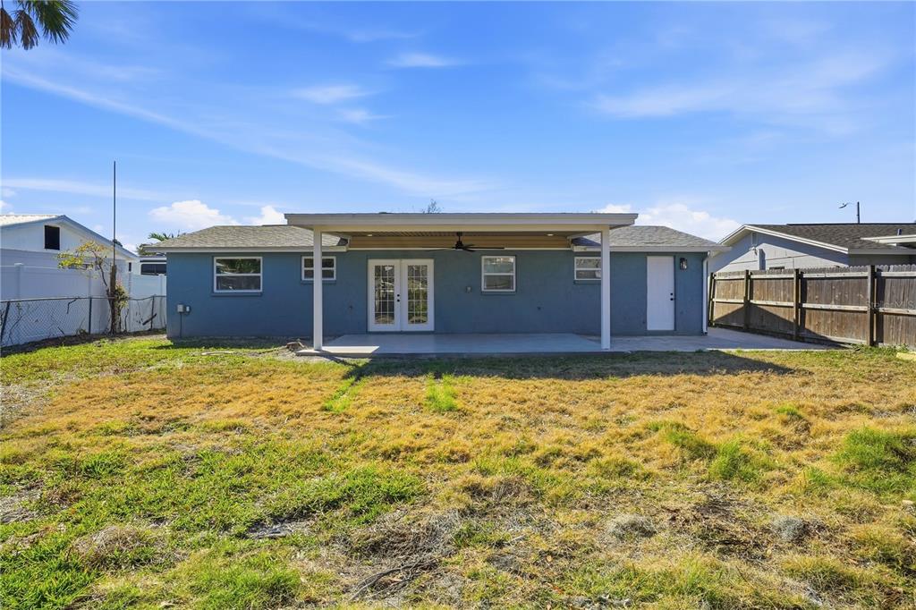 5543 Quist Drive Port Richey, FL 34668 - Photo 22 of 29 a view of a house with a yard