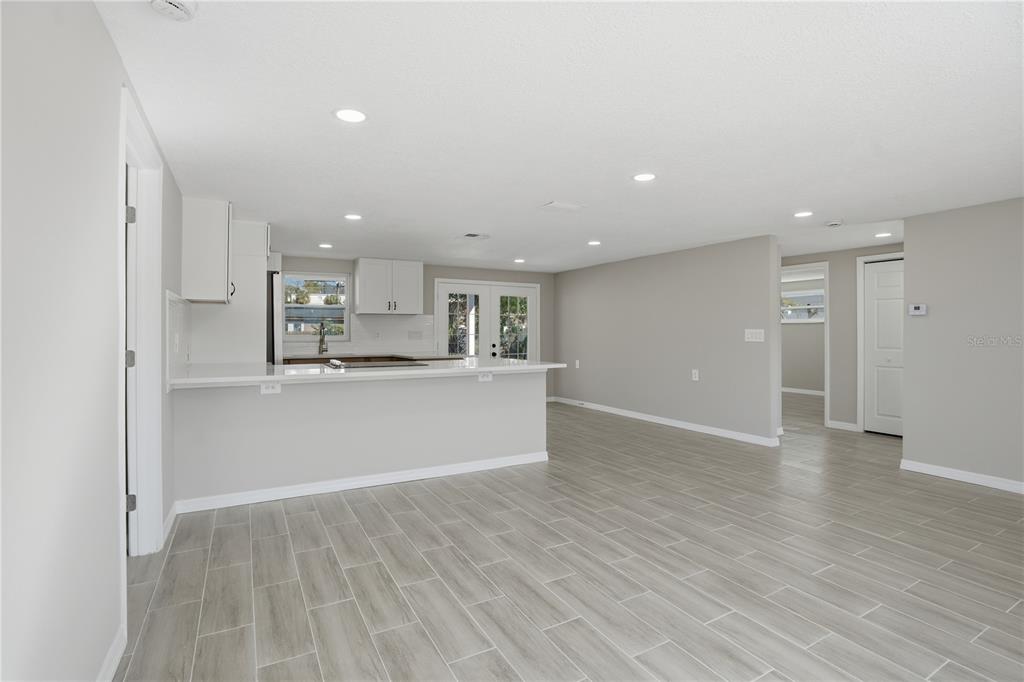 5543 Quist Drive Port Richey, FL 34668 - Photo 10 of 29 a view of kitchen with wooden floor