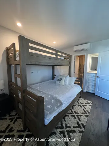 a room with pool table and furniture