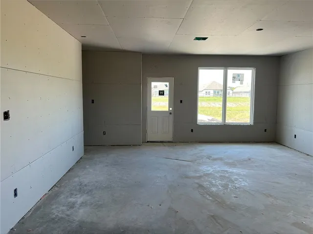 a view of an empty room with window