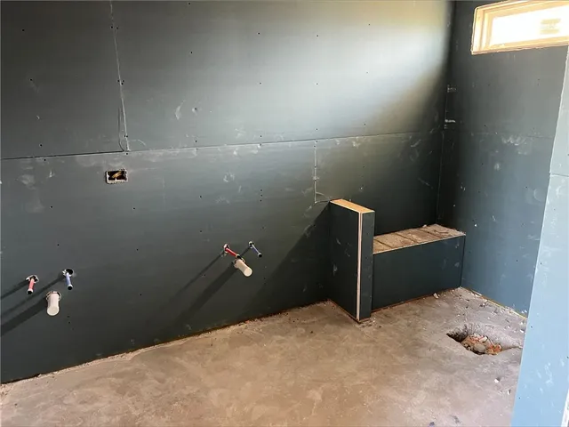 a bathroom with a toilet